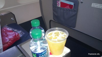 Delta Airlines - Airbus A319 - N362NB - DL977 - Klasa Pierwsza (First Class) - welcome drink - sok pomarańczowy - czerwiec 2013